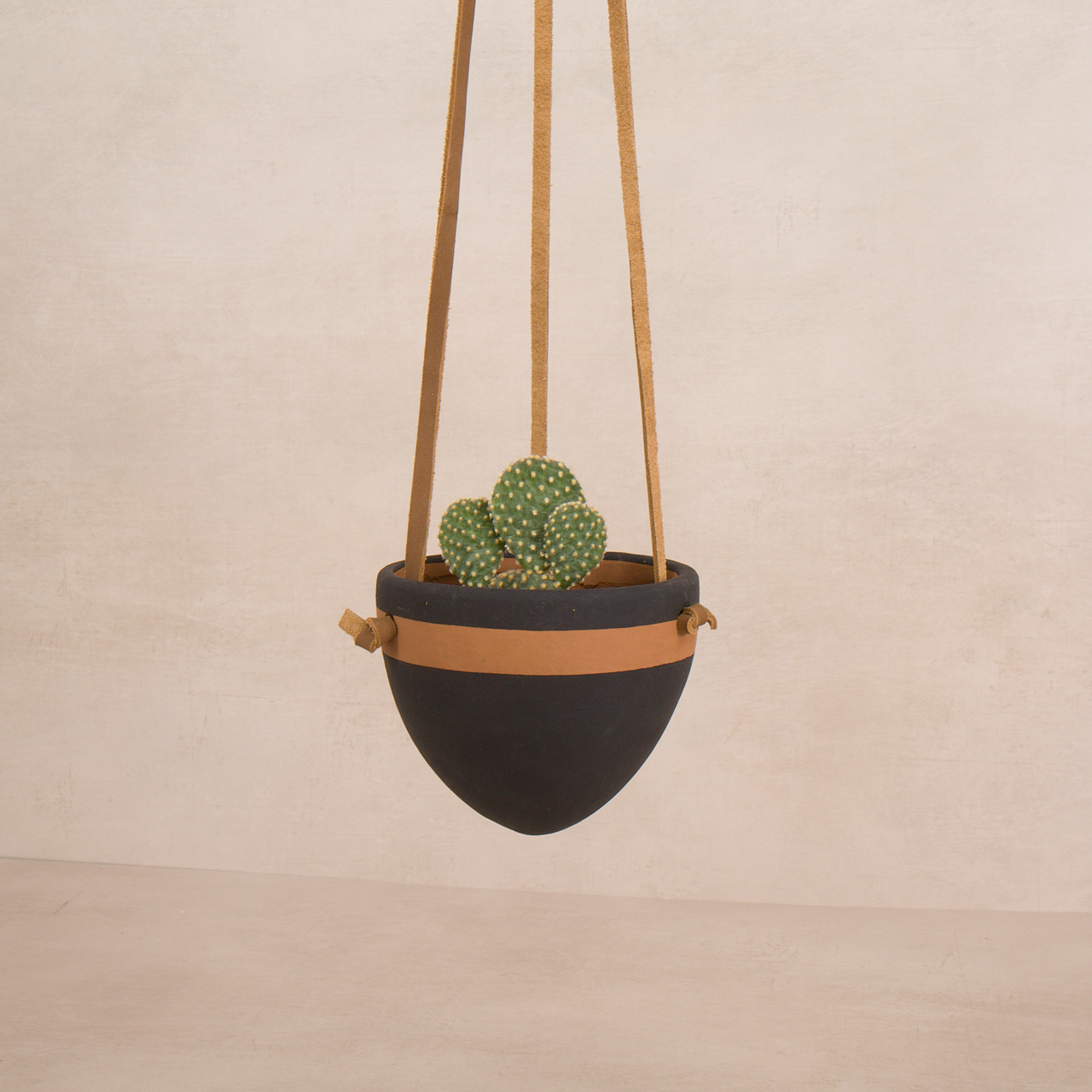 Women of the Cloud Forest planter Black Terracotta Hanging Planter with Leather Hanger