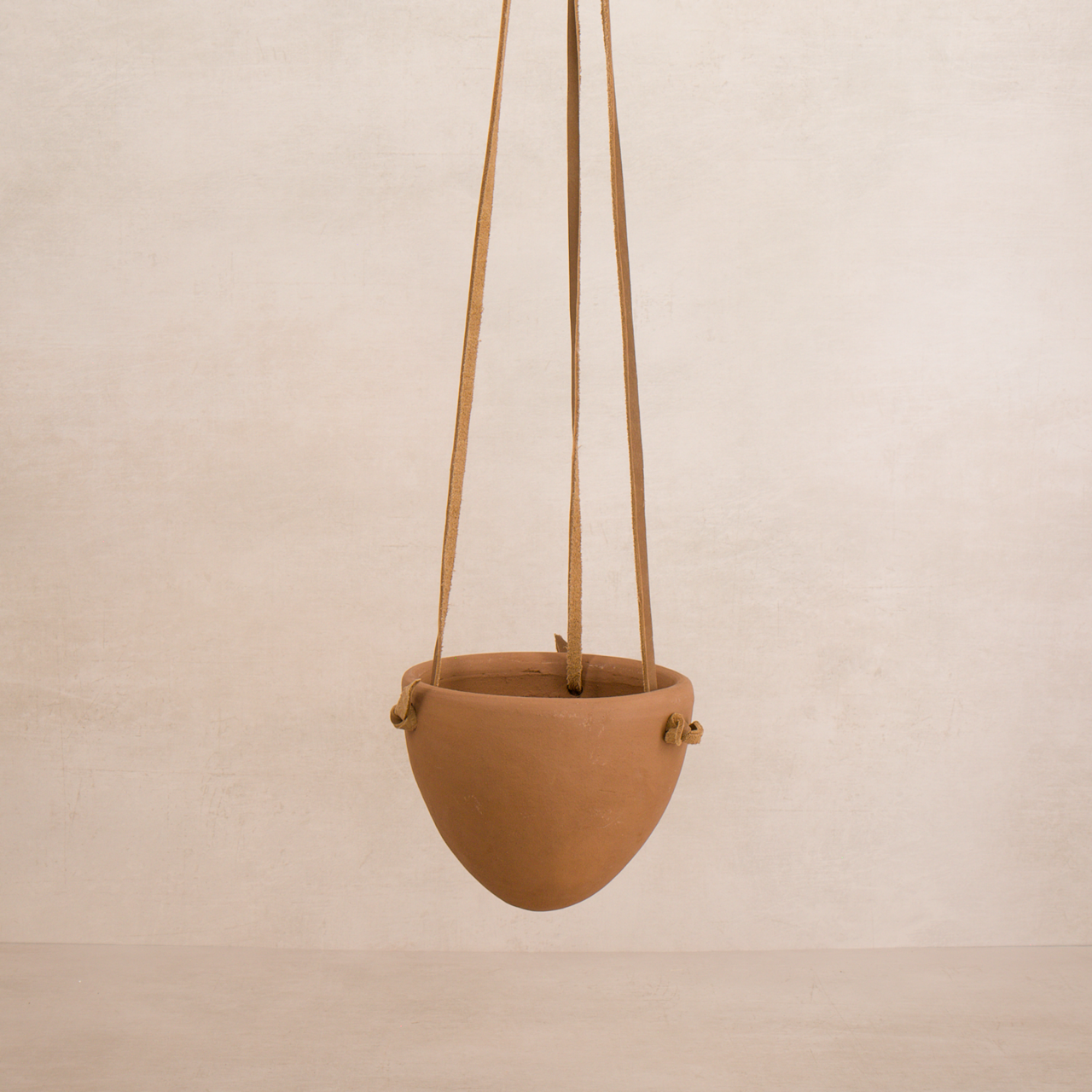 Women of the Cloud Forest planter Terracotta Hanging Planter with Leather Hanger
