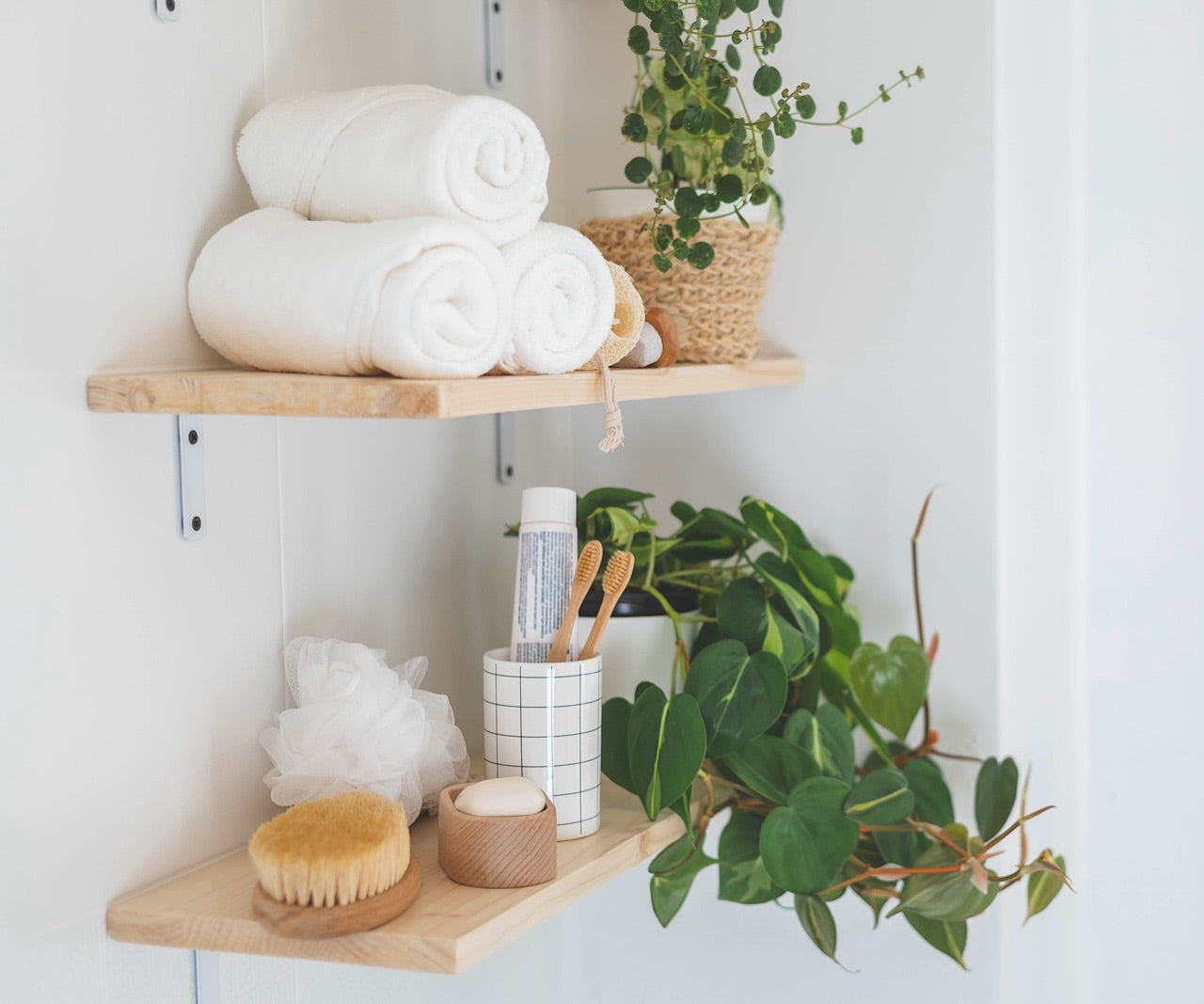 styled floating bathroom shelves