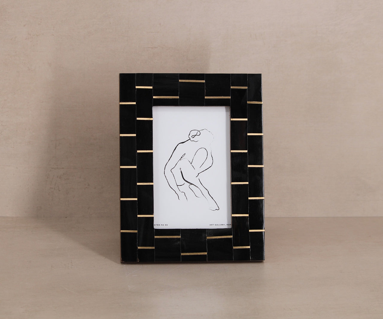 Black picture frame with line drawing art print