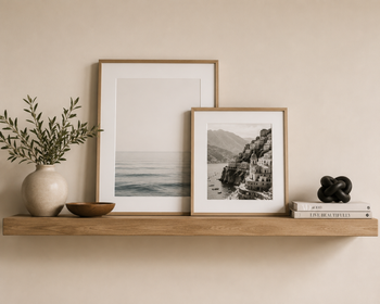 natural shelf decor with framed photos styled on shelf