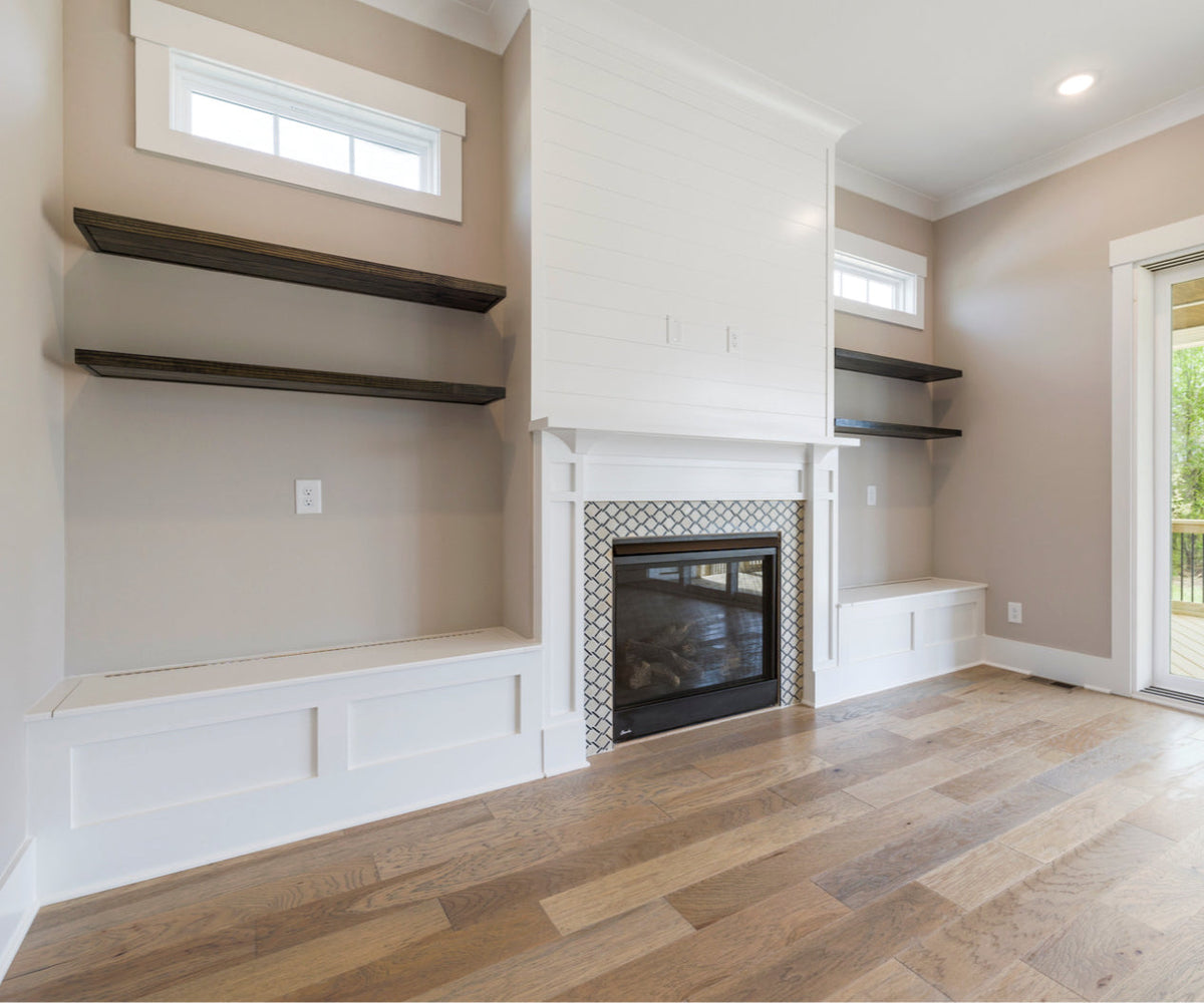 empty shelves around fireplace