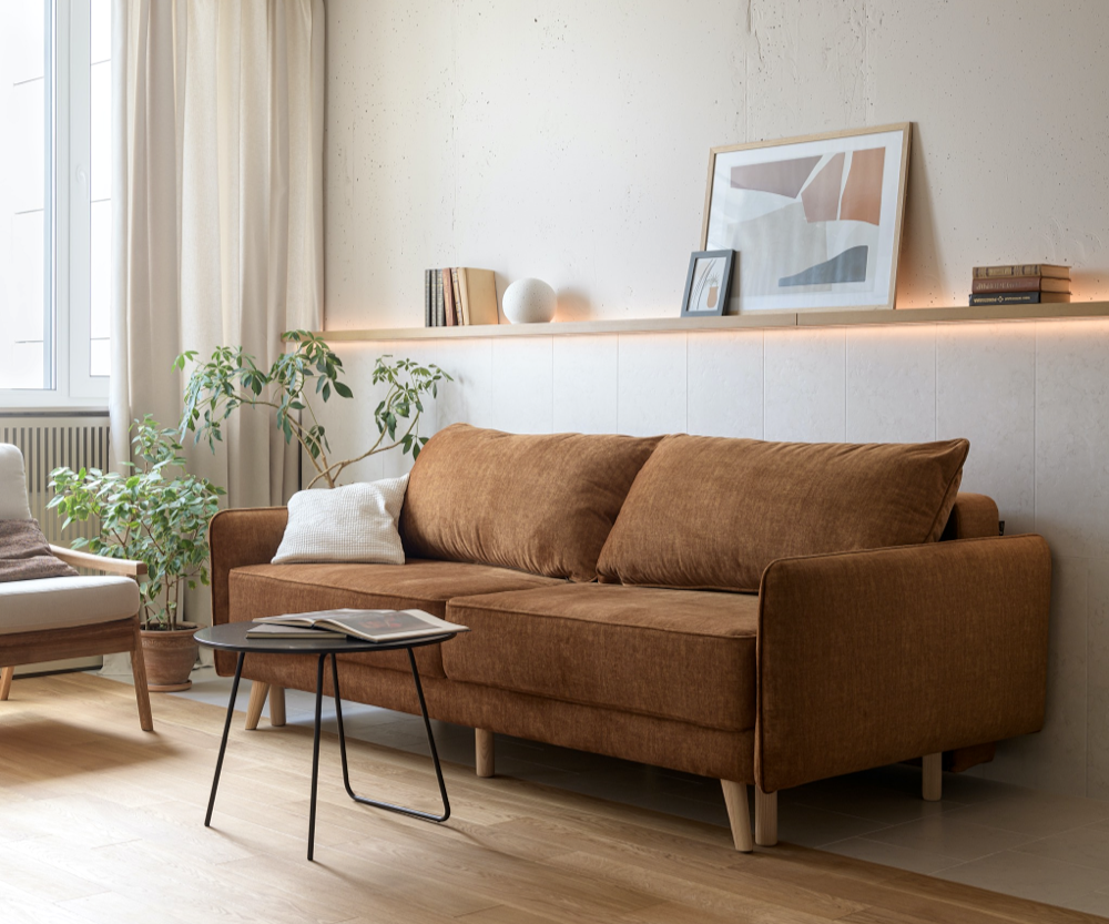 long floating shelf over couch in living room