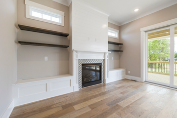 empty shelves around fireplace