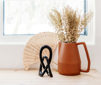 natural shelf decor styled on shelf