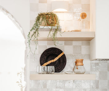 artisan made baskets on kitchen shelves